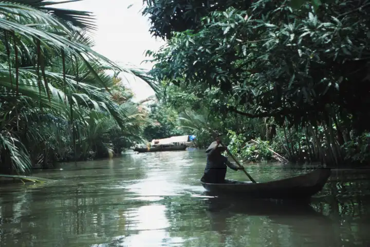 Vietnamese fisherman in the mekong-delta