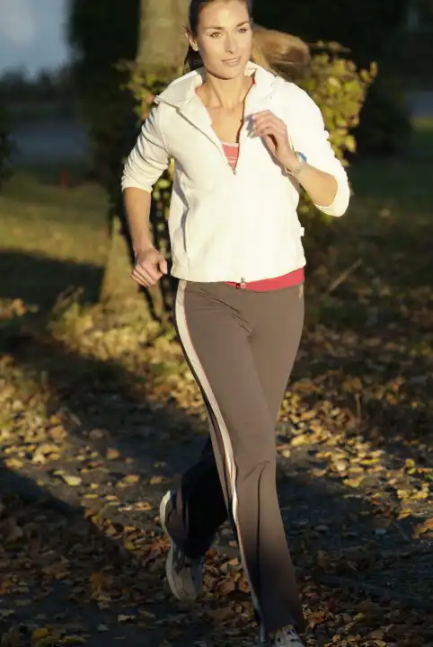 Woman jogging in sunset