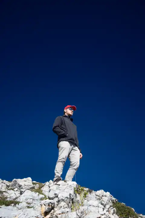 man on the top of a mountain