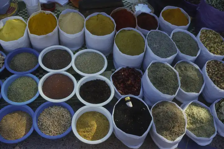spices in bowls and bags
