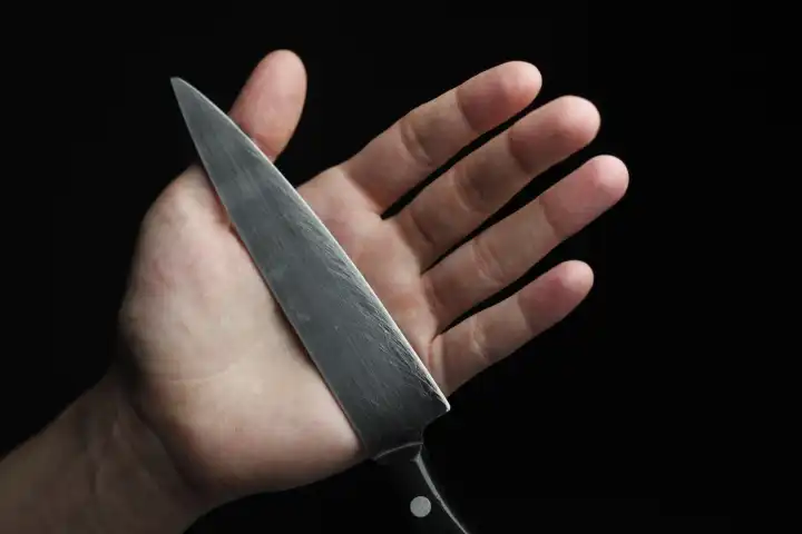 Messer in der Hand