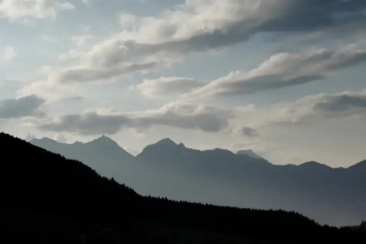 Mountains under cloudy sky