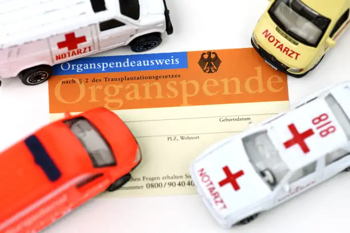 Toy cars on an organ donor card