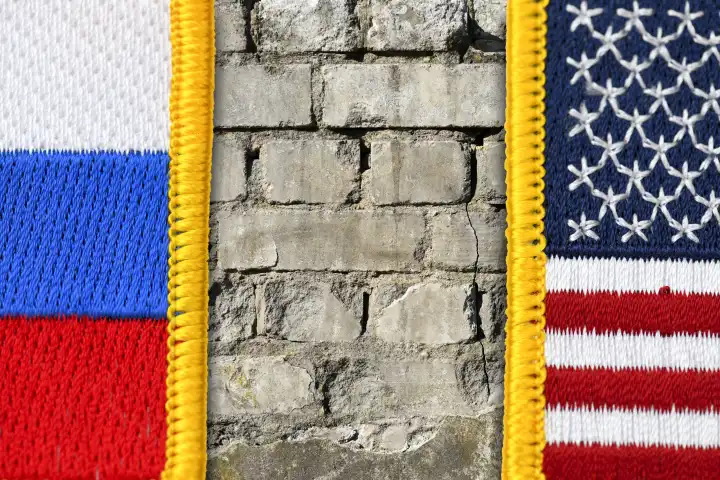 Wall between the flags of the USA and Russia, termination of the INF Treaty
