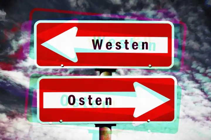 Einbahnstraßenschilder mit Aufschrift Westen und Osten