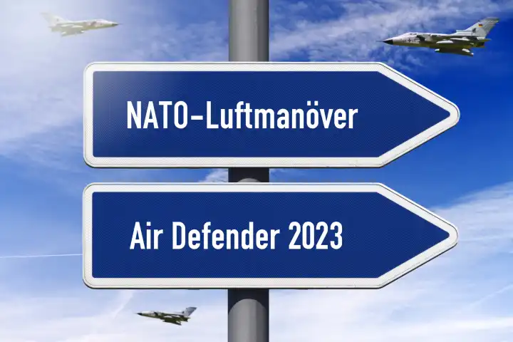 Signpost with inscription NATO air maneuver and Air Defender 2023