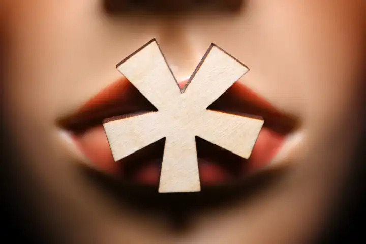 Gender star on the mouth of a woman figure, symbol photo gender language