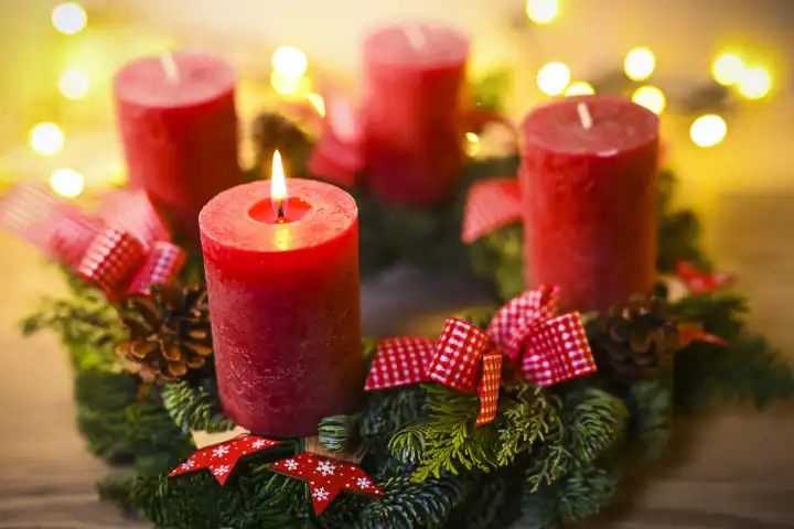 Advent wreath with burning candle
