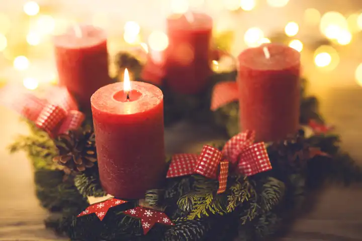 Advent wreath with burning candle