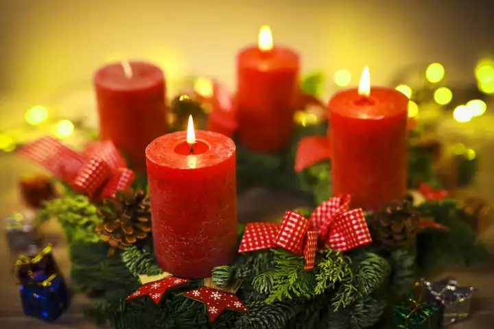 Advent wreath with three burning candles