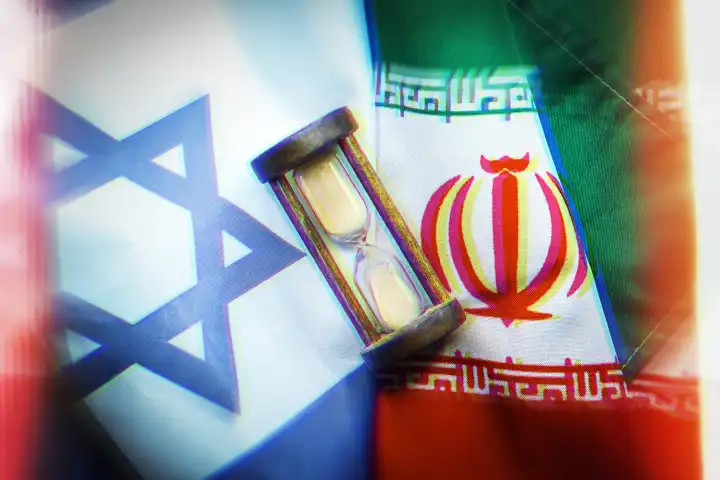 Hourglass on the flags of Israel and Iran, Middle East conflict, photomontage