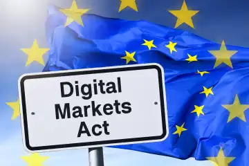 Sign with inscription Digital Markets Act in front of EU flag, photomontage