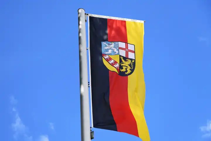 Waving flag of the German federal state of Saarland