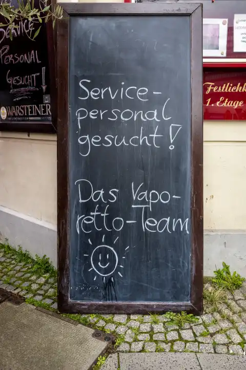 Service staff wanted, slate with inscription, Berlin, Germany