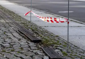 Temporary barrier next to a danger zone on the sidewalk at the Federal Foreign Office, Berlin, Germany