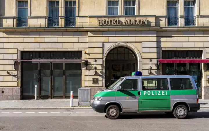 Police car in front of the side entrance of the Hotel Adlon, Berlin, Germany