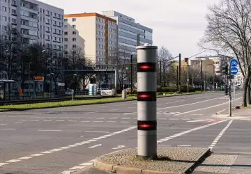 Traffic light flashers at a road junction, Berlin, Germany