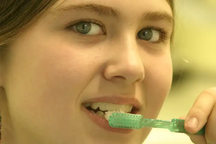 Girl brushing her Teeth