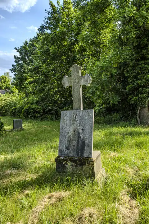 Gravestone with cross, historical Protestant cemetery Bad Carlsruhe (Pokoj), district Namslau (Namyslow), voivodship Oppeln, Upper Silesia, Poland.