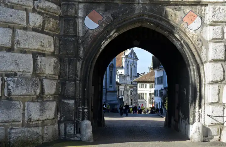 View through the city gate Baseltor into the old town of Solothurn, Switzerland