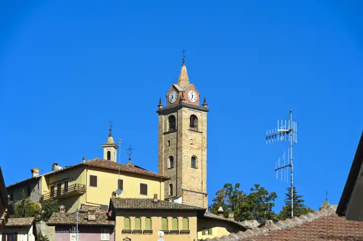 The bell tower rises above the old town of Monforte d'Alba, Piedmont, Italy
