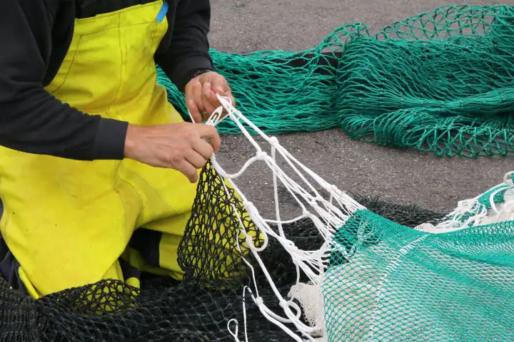 Flicken der Fischernetze