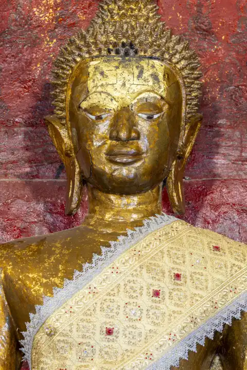 Golden Buddha statue, Bhumispara-mudra, Buddha Gautama at the moment of enlightenment, Wat Long Koon, Luang Prabang, Laos, Asia
