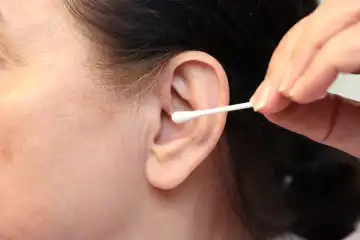 Ear care with a cotton bud