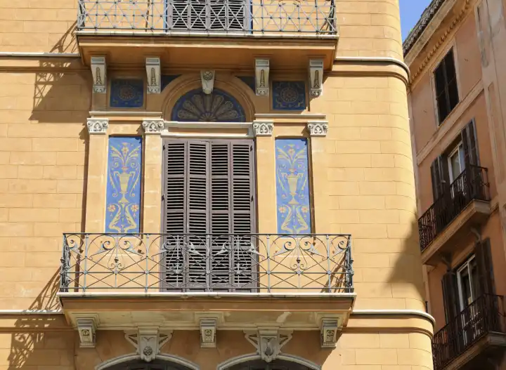 Residential house with balconies and mural painting, Palma, Spain