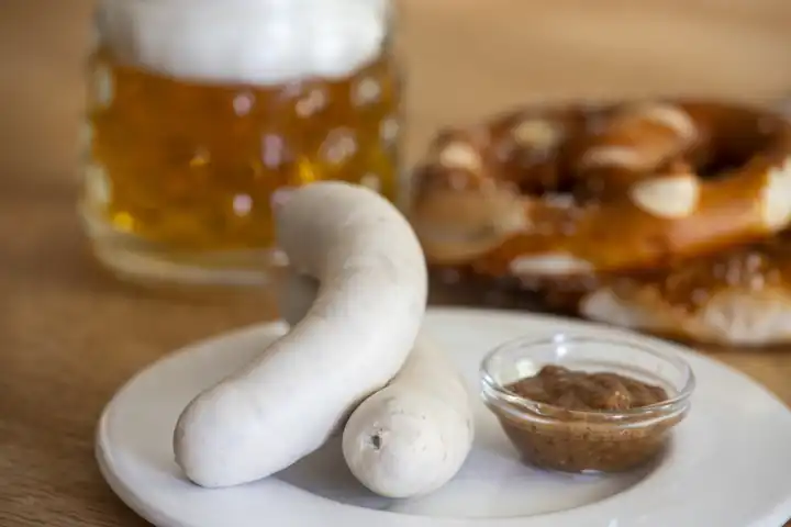 Bavarian white sausages on wood 