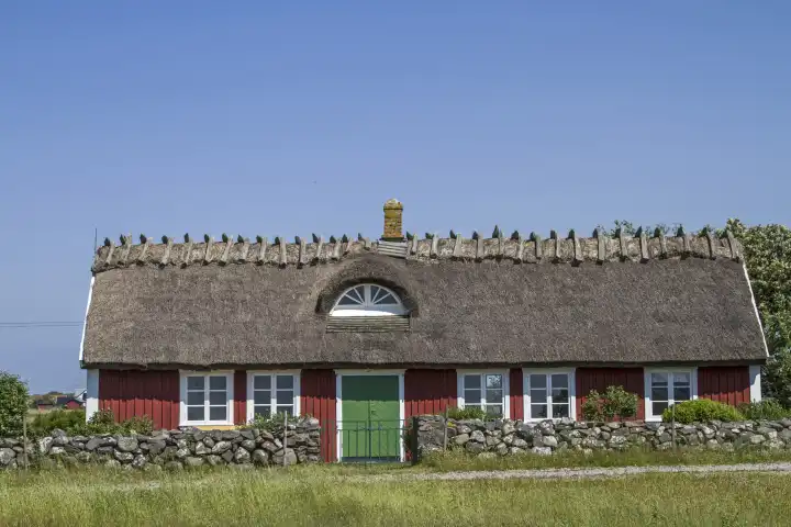 House idyll in Halland - red wooden house on the Swedish North Sea coast