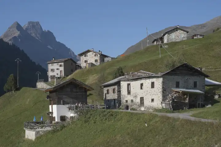 Small idyllic alpine village in the original high mountain valley Val Viola in the Stelvio National Park in Italy