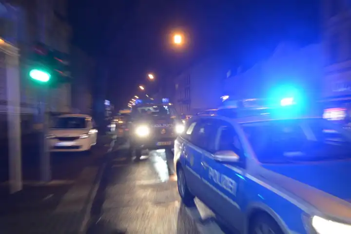 Police car on the street at night