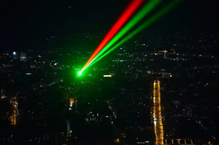 Laser beams over Kassel at night