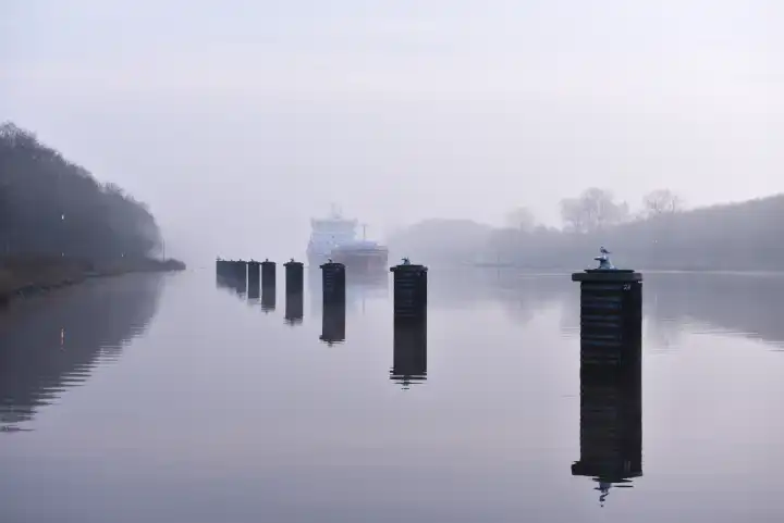 LNG tanker sails in fog in the Kiel Canal