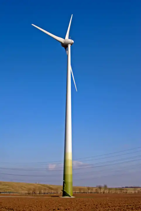 single wind turbine on the field