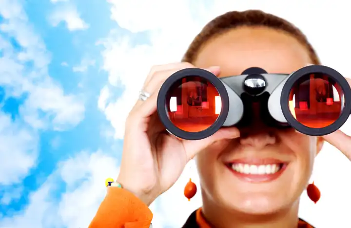business searchwoman looking through binoculars