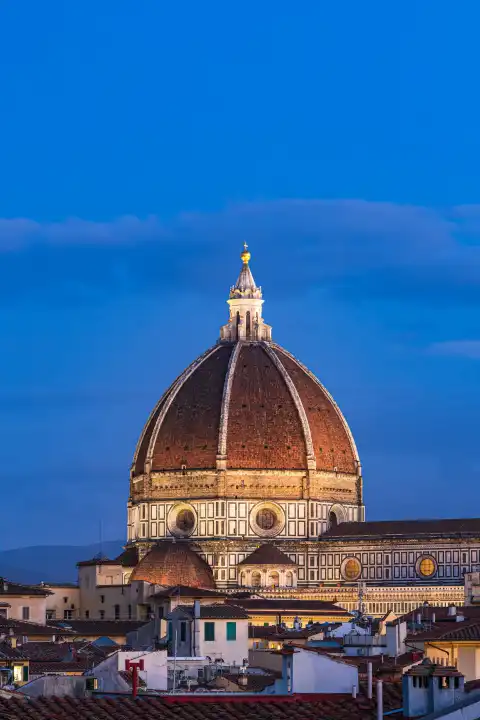 View of the Cathedral of Santa Maria del Fiore at blue hour in Florence, Italy.