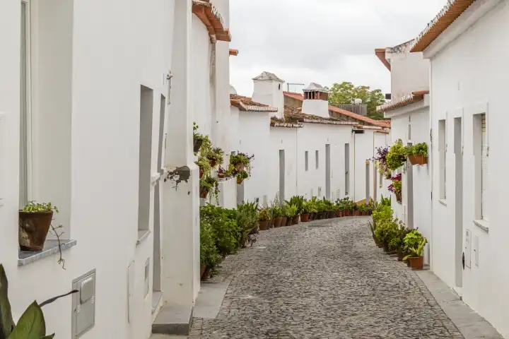 alley in the moorish district in Moura with white houses, Alentejo, Portugal