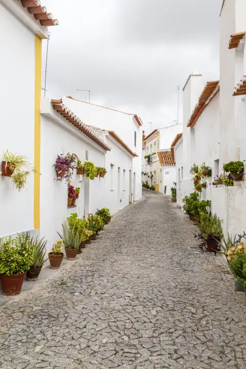 alley in the moorish district in Moura with white houses, Alentejo, Portugal