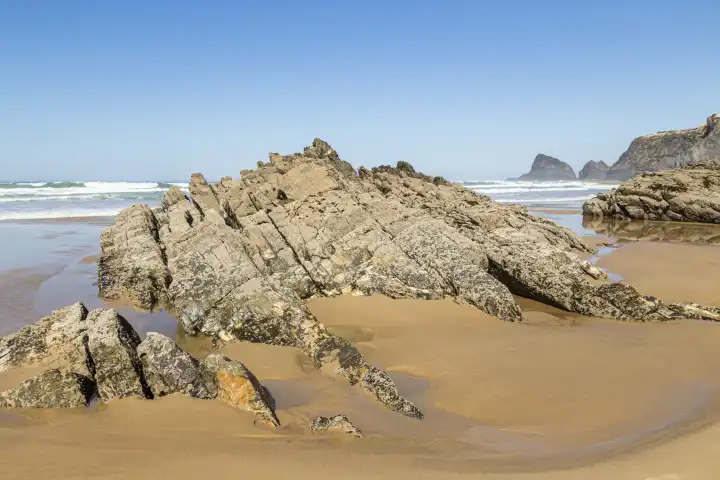 beach with rock near Odeceixe, Algarve, Portugal