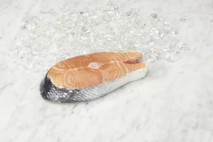 Salmon slice on marble slab