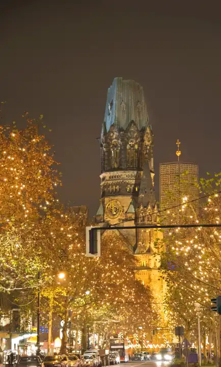 berlin kaiser wilhelm gedächtniskirche in christmastime with illuminated trees