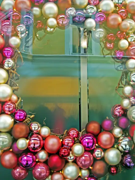 Christmas decoration with glass balls in a window