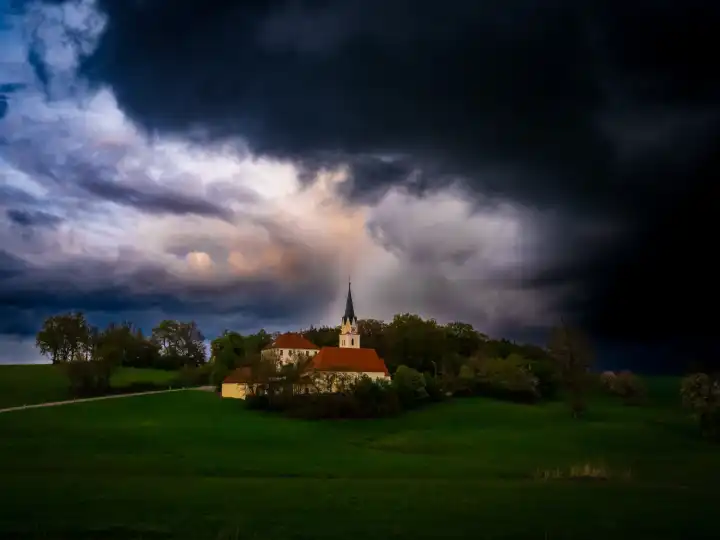 Storm clouds over a church