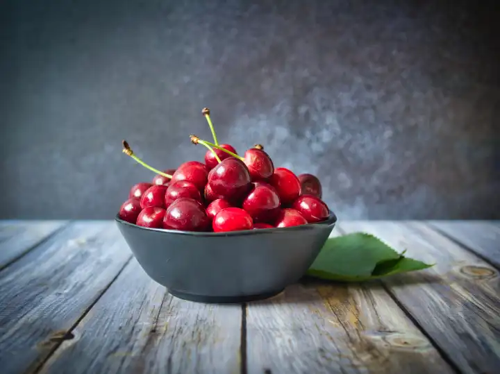 Cherries in a small bowl