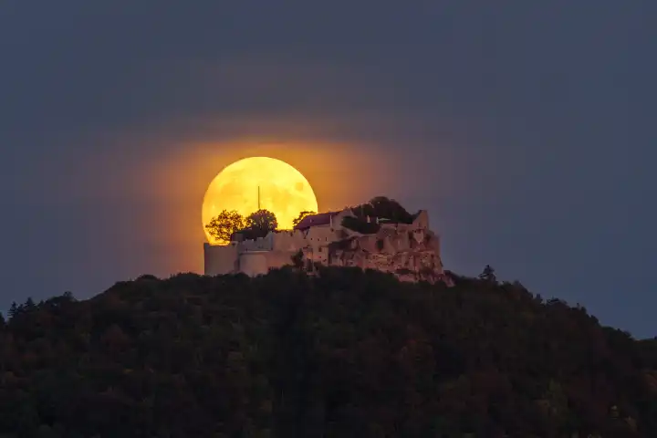 Full moon behind Hohenneuffen Castle