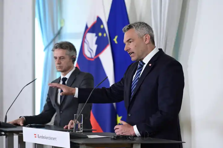 Vienna, Austria. June 13, 2023 Press conference with the Prime Minister of the Republic of Slovenia Robert Golob (L) and the Austrian Chancellor Karl Nehammer (R) at the Federal Chancellery in Vienna.
