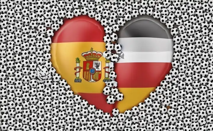 Spanien und Deutschland Flaggen auf einem Herz mit Fußbällen drum herum, generiert mit KI