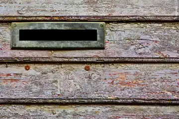 mailbox in a old gate